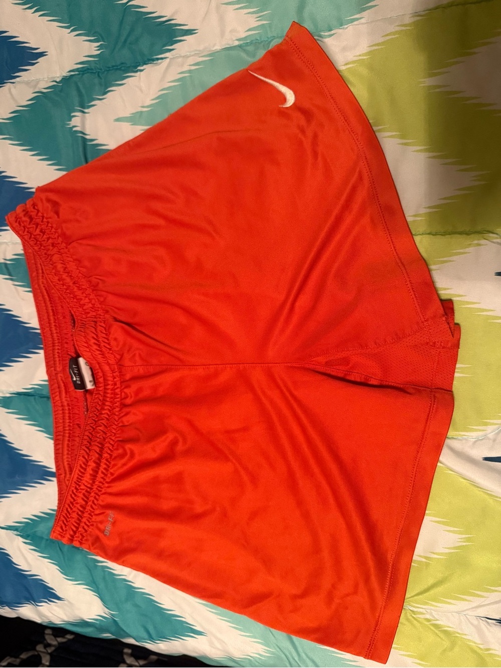 Nike Women's Bright Orange Athletic Shorts with White Swoosh